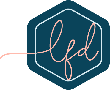 honeycomb shaped icon with cursive lfd text on top